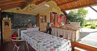 Chambre d'hôtes du Clos de l'Arthonnet à Flavignac en Haute-Vienne (Nouvelle Aquitaine) - Terrasse couverte_16